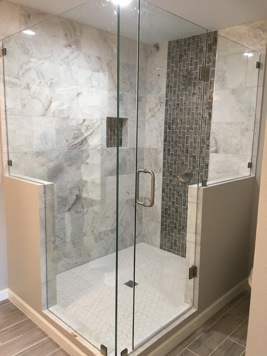 Frameless glass shower enclosure by Diversity Showers