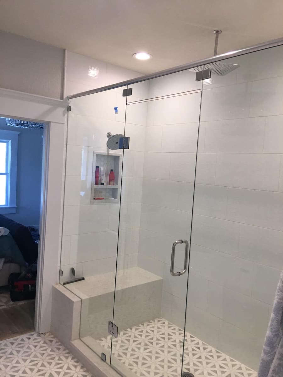 Frameless enclosure with support bar