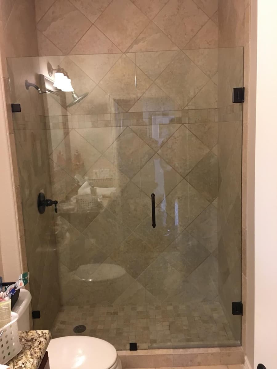 Inline frameless glass shower enclosure by Diversity Showers