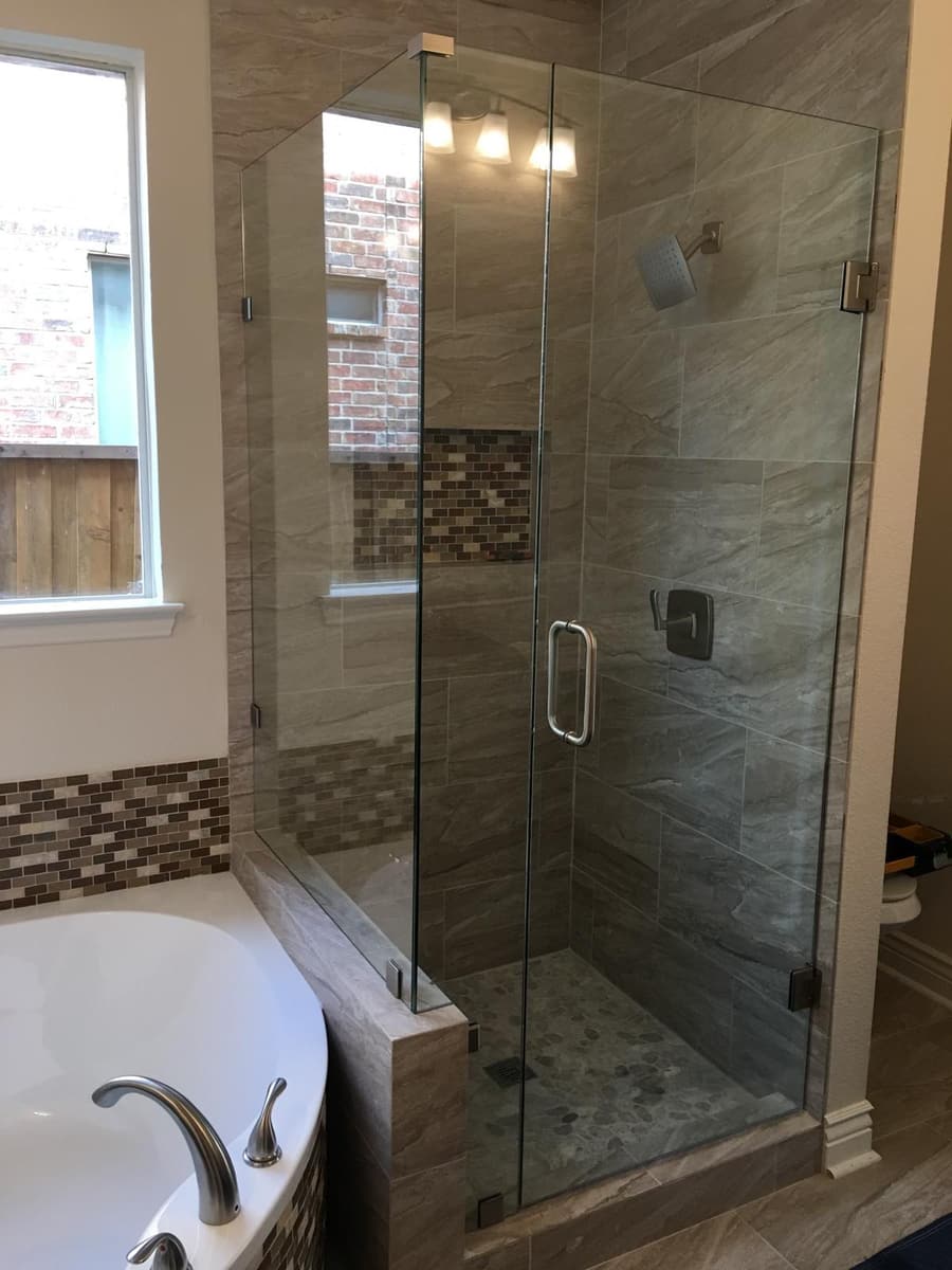 Frameless corner shower